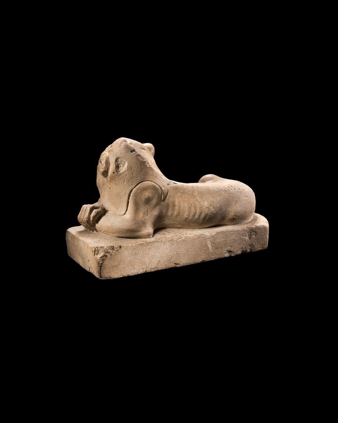 Egyptian statue of a recumbent lion | MasterArt